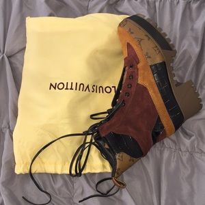 Louis Vuitton combat boots.